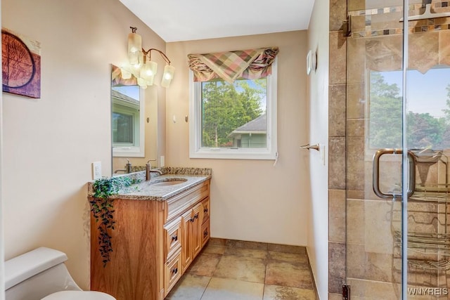 515 Park Club Ln, Amherst, NY 14221 - full bathroom with vanity, toilet, a shower stall, and baseboards