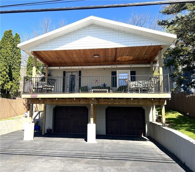 5545 E Lake Rd, Conesus, NY 14435 - view of front of house with an attached garage and driveway