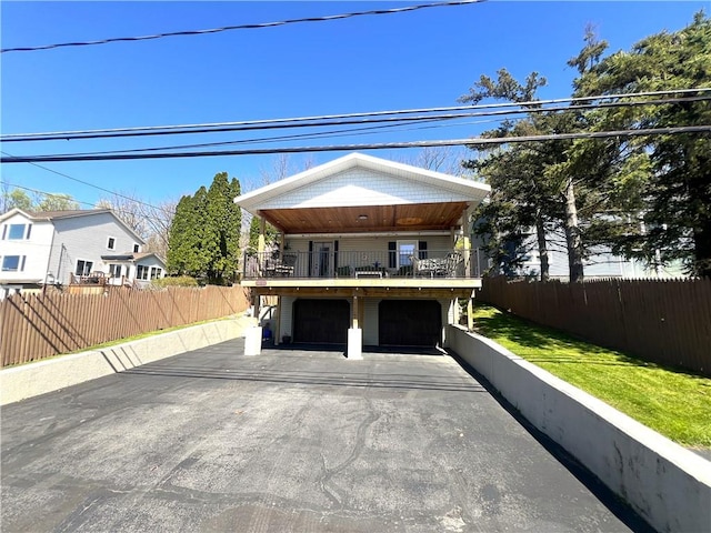 5545 E Lake Rd, Conesus, NY 14435 - coastal inspired home featuring a garage and driveway