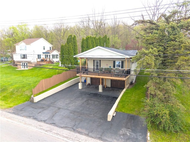 5545 E Lake Rd, Conesus, NY 14435 - view of front of home featuring driveway, a front lawn, and a porch