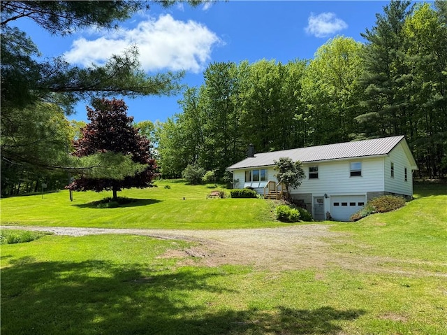 2113 Prosser Hollow Rd, Davenport, NY 13820 - view of grassy yard with driveway and an attached garage