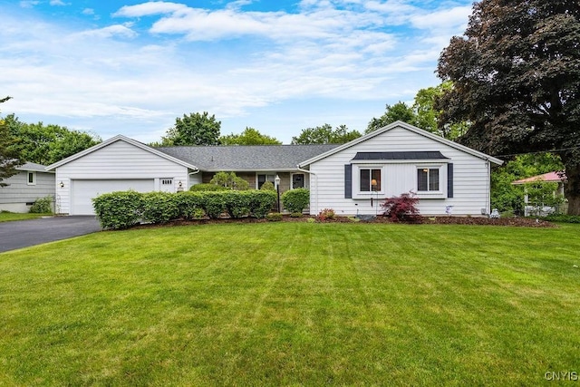 4922 Tenterden Dr, Onondaga, NY 13215 - single story home featuring asphalt driveway, an attached garage, and a front yard