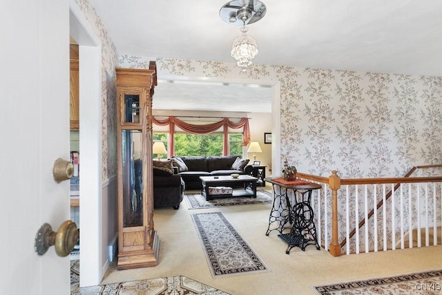 4922 Tenterden Dr, Onondaga, NY 13215 - carpeted living area featuring wallpapered walls and a chandelier