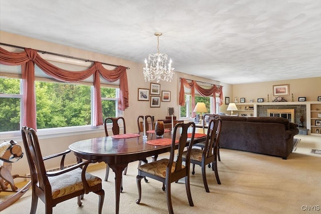 4922 Tenterden Dr, Onondaga, NY 13215 - dining space featuring light carpet and a chandelier
