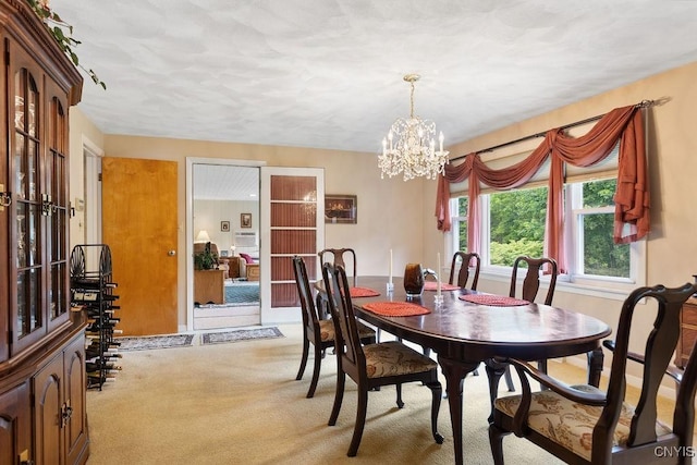 4922 Tenterden Dr, Onondaga, NY 13215 - dining area featuring light colored carpet and a chandelier