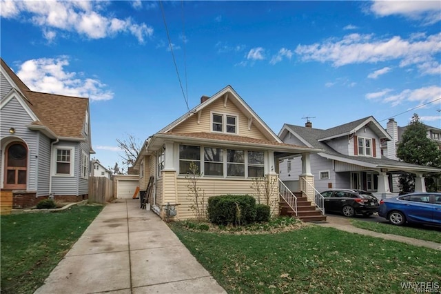 1214 Roselle Ave, Niagara Falls, NY 14305 - view of front of house with a front yard and a garage