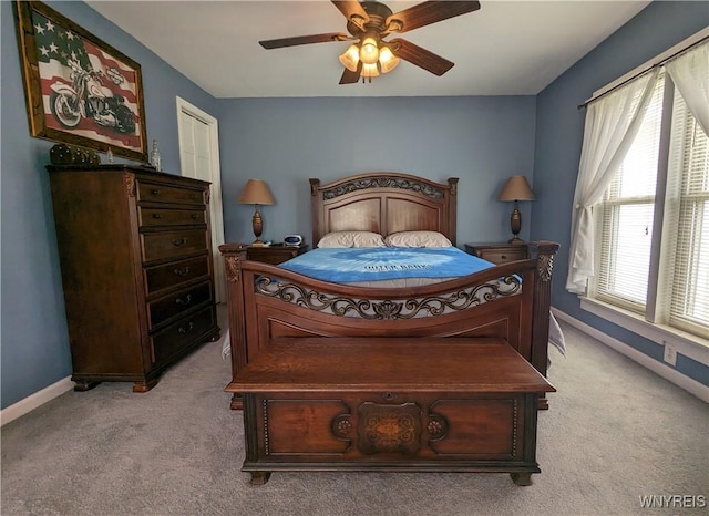 117 N 8th St, Olean-City, NY 14760 - bedroom with light carpet, baseboards, and a ceiling fan