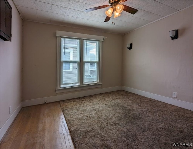 117 N 8th St, Olean-City, NY 14760 - spare room with a ceiling fan, baseboards, and wood finished floors