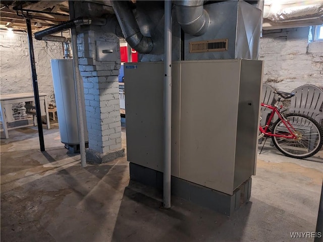 117 N 8th St, Olean-City, NY 14760 - utility room featuring water heater and heating unit