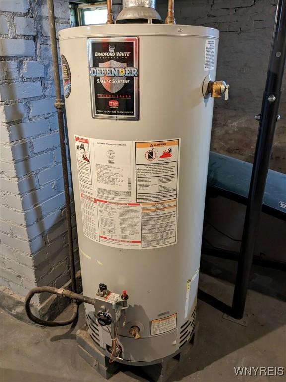 117 N 8th St, Olean-City, NY 14760 - utility room with water heater