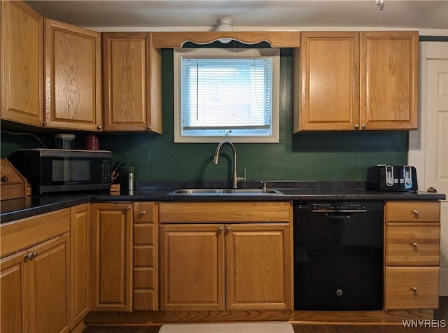 117 N 8th St, Olean-City, NY 14760 - kitchen with black appliances, a sink, and dark countertops