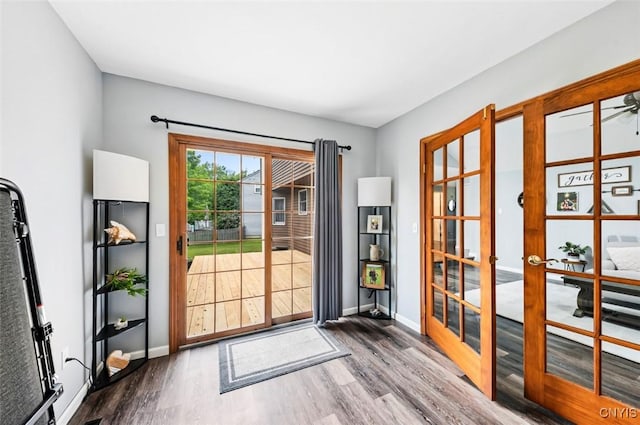 8005 Fir Dr, Clay, NY 13041 - doorway to outside with wood finished floors, french doors, and baseboards