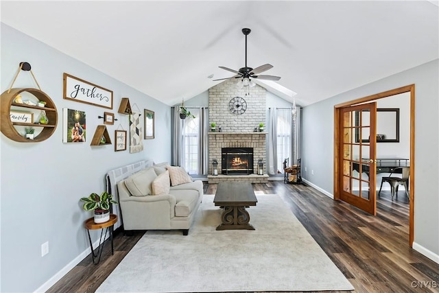 8005 Fir Dr, Clay, NY 13041 - living area featuring ceiling fan, dark wood-style floors, vaulted ceiling, a fireplace, and baseboards