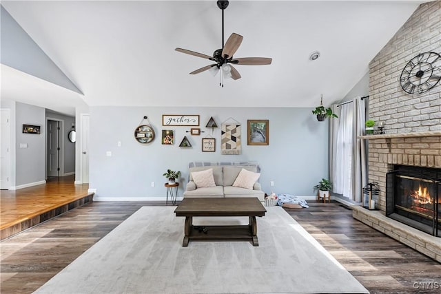 8005 Fir Dr, Clay, NY 13041 - living area featuring ceiling fan, wood finished floors, a brick fireplace, baseboards, and high vaulted ceiling