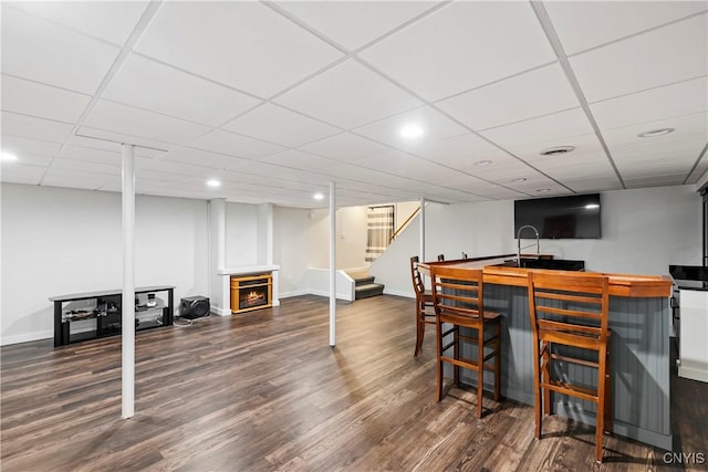 8005 Fir Dr, Clay, NY 13041 - indoor bar with stairway, wood finished floors, baseboards, a warm lit fireplace, and recessed lighting