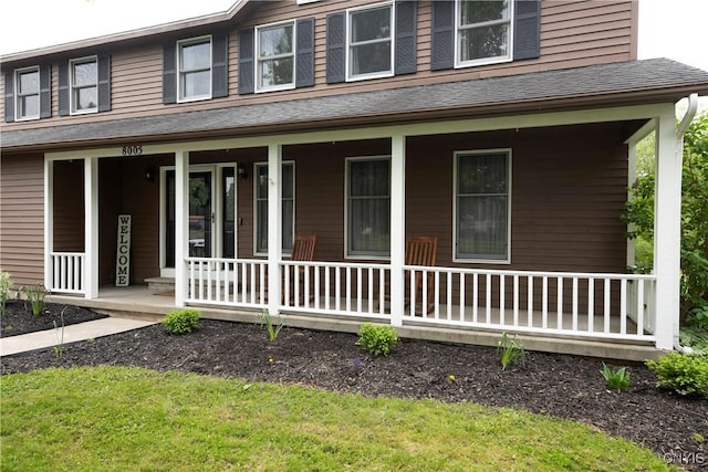 8005 Fir Dr, Clay, NY 13041 - farmhouse-style home featuring a porch