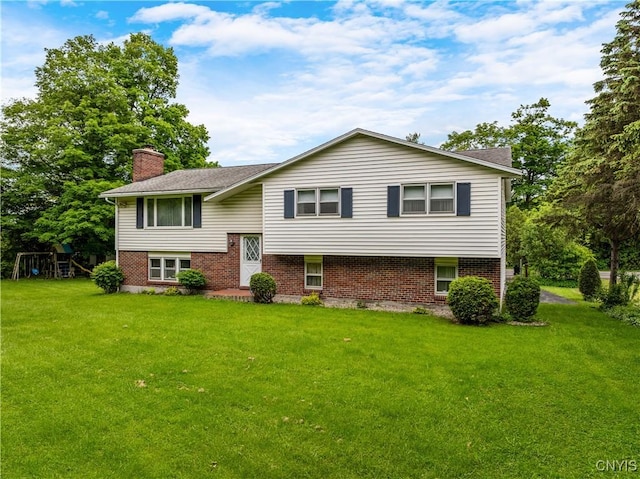 7322 Highbridge Rd, Manlius, NY 13066 - split foyer home with a front lawn, a chimney, and brick siding