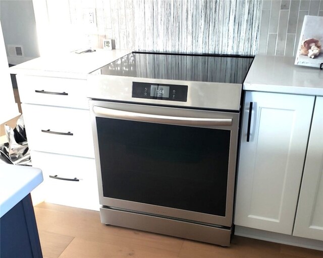 30 Legends Way, Greece, NY 14612 - kitchen with stainless steel range with electric stovetop and light countertops