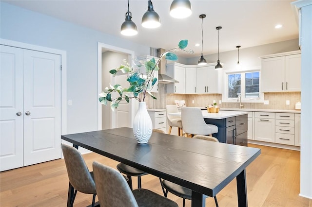 30 Legends Way, Greece, NY 14612 - dining space with light wood-style flooring and recessed lighting