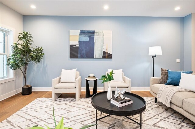 30 Legends Way, Greece, NY 14612 - living area featuring wood finished floors, plenty of natural light, recessed lighting, and baseboards