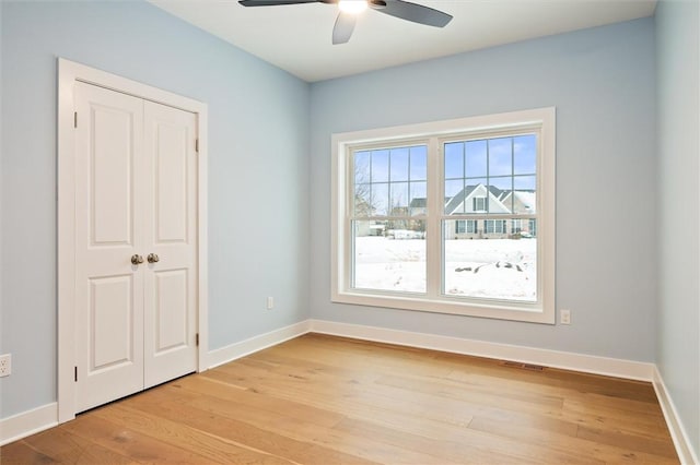 30 Legends Way, Greece, NY 14612 - empty room featuring ceiling fan, light wood-style floors, and baseboards