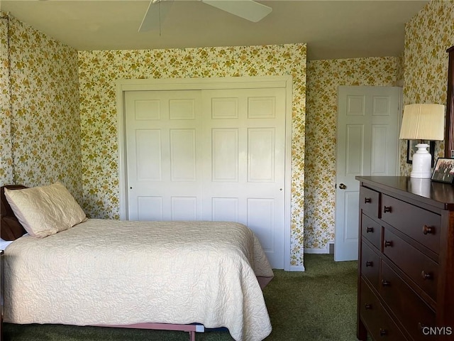 624 Deerfield Dr, Oneida-Inside, NY 13421 - bedroom featuring wallpapered walls, a closet, dark carpet, and baseboards