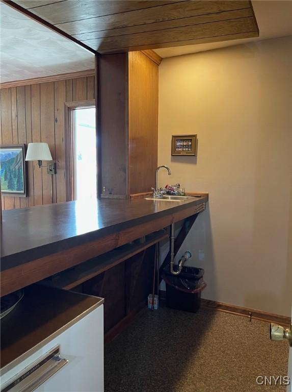 624 Deerfield Dr, Oneida-Inside, NY 13421 - office area with baseboards, wood walls, a sink, and wooden ceiling