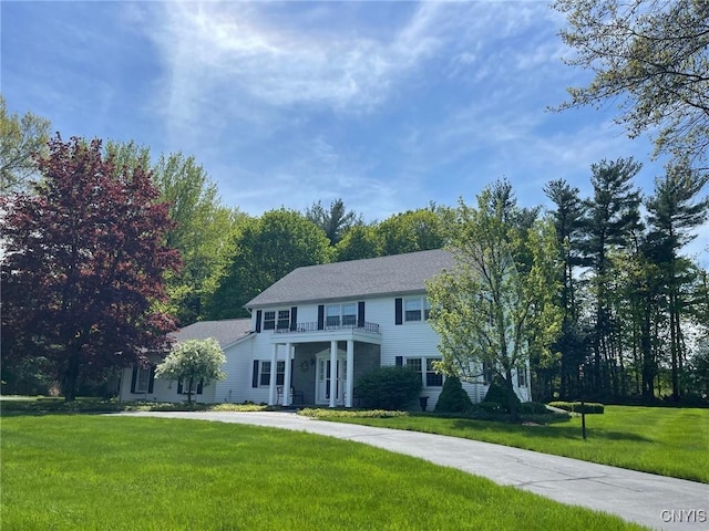 624 Deerfield Dr, Oneida-Inside, NY 13421 - colonial home featuring a balcony and a front yard