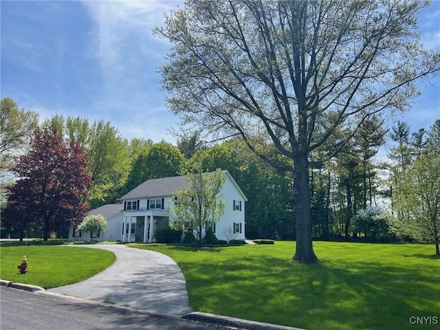 624 Deerfield Dr, Oneida-Inside, NY 13421 - view of front of house with a front lawn and curved driveway