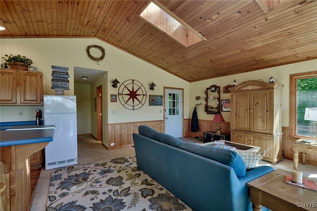 Hanson Bridge Road, Theresa, NY 13691 - living room featuring a wainscoted wall, wooden ceiling, vaulted ceiling, wooden walls, and light carpet