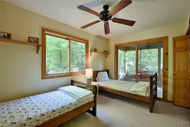 Hanson Bridge Road, Theresa, NY 13691 - bedroom with multiple windows, carpet, access to exterior, and ceiling fan