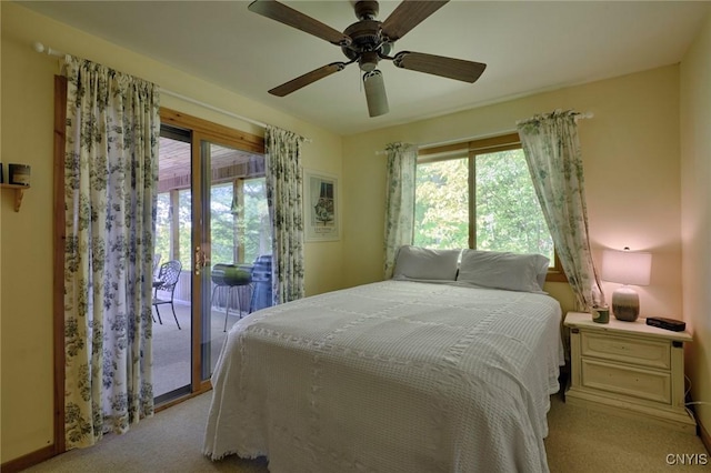Hanson Bridge Road, Theresa, NY 13691 - bedroom featuring access to exterior, light colored carpet, multiple windows, and ceiling fan