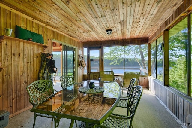 Hanson Bridge Road, Theresa, NY 13691 - sunroom with outdoor dining space and a water view