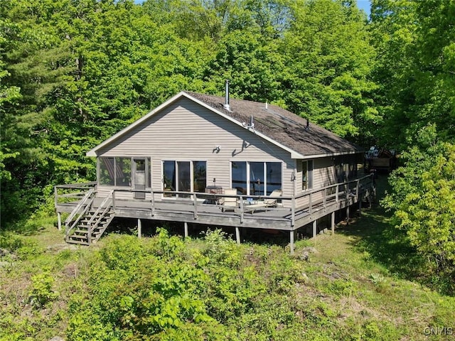 Hanson Bridge Road, Theresa, NY 13691 - back of property with a wooden deck and a wooded view