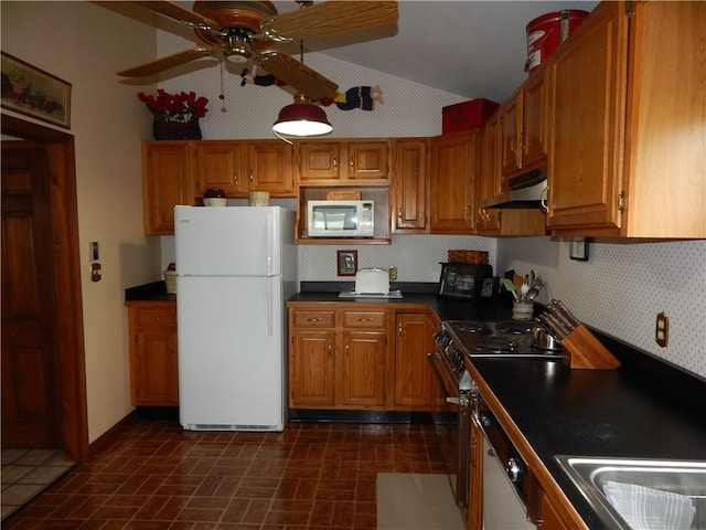 6731 Lake Salubria Dr, Bath, NY 14810 - kitchen with white appliances, under cabinet range hood, lofted ceiling, a ceiling fan, and brown cabinetry