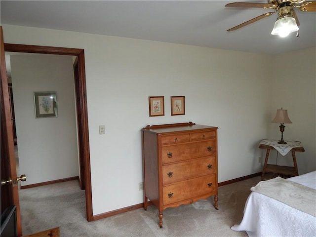 6731 Lake Salubria Dr, Bath, NY 14810 - bedroom with light carpet, baseboards, and a ceiling fan