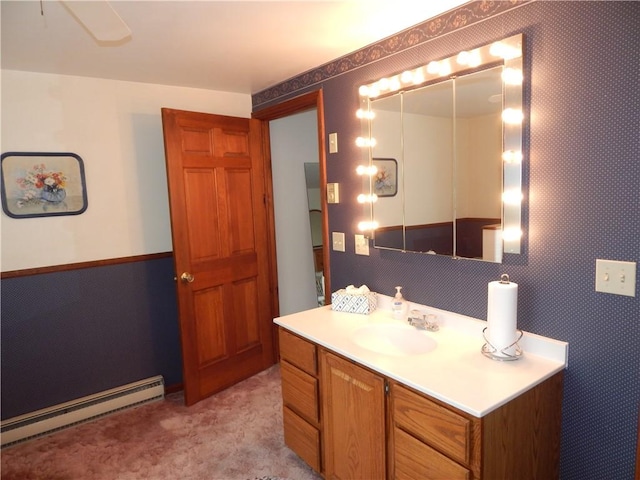 6731 Lake Salubria Dr, Bath, NY 14810 - bathroom featuring a baseboard heating unit and vanity