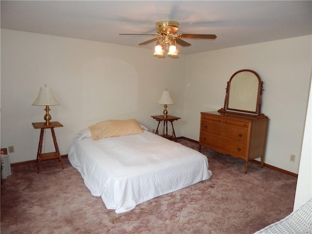 6731 Lake Salubria Dr, Bath, NY 14810 - bedroom with carpet flooring, baseboards, and a ceiling fan