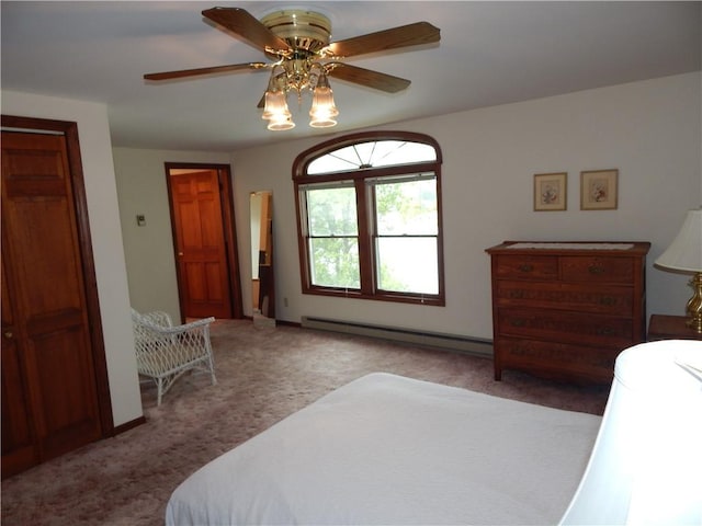 6731 Lake Salubria Dr, Bath, NY 14810 - carpeted bedroom with baseboard heating and a ceiling fan