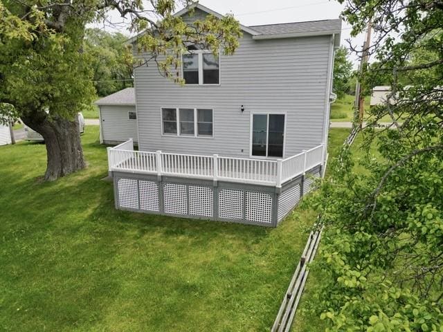 6731 Lake Salubria Dr, Bath, NY 14810 - rear view of house with a lawn and a deck