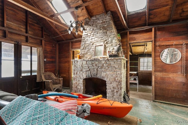 3435 E Lake Rd, Skaneateles, NY 13152 - bedroom featuring wood ceiling with exposed beams, wooden walls, a fireplace, high vaulted ceiling, and wood finished floors
