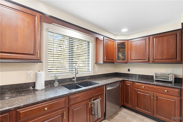 147 Crooked Lake Rd, Tully, NY 13159 - kitchen with dishwasher, dark stone counters, light wood-style flooring, and glass insert cabinets