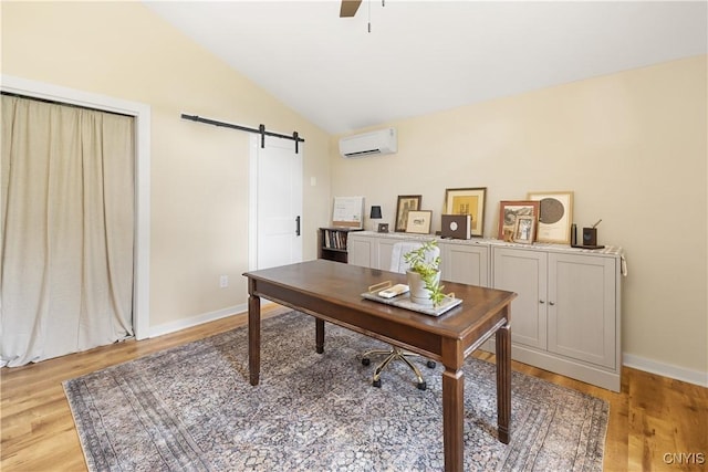 147 Crooked Lake Rd, Tully, NY 13159 - office area featuring a wall mounted AC, a barn door, lofted ceiling, light wood-style floors, and ceiling fan