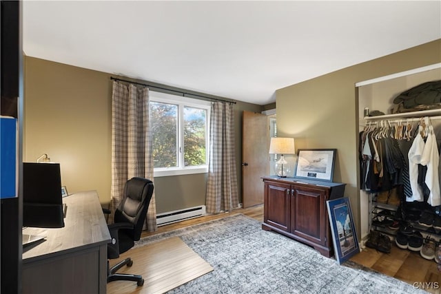 147 Crooked Lake Rd, Tully, NY 13159 - office space featuring a baseboard radiator and wood finished floors
