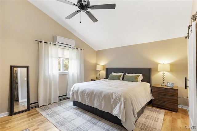 147 Crooked Lake Rd, Tully, NY 13159 - bedroom featuring an AC wall unit, light wood-style floors, vaulted ceiling, a baseboard radiator, and a ceiling fan