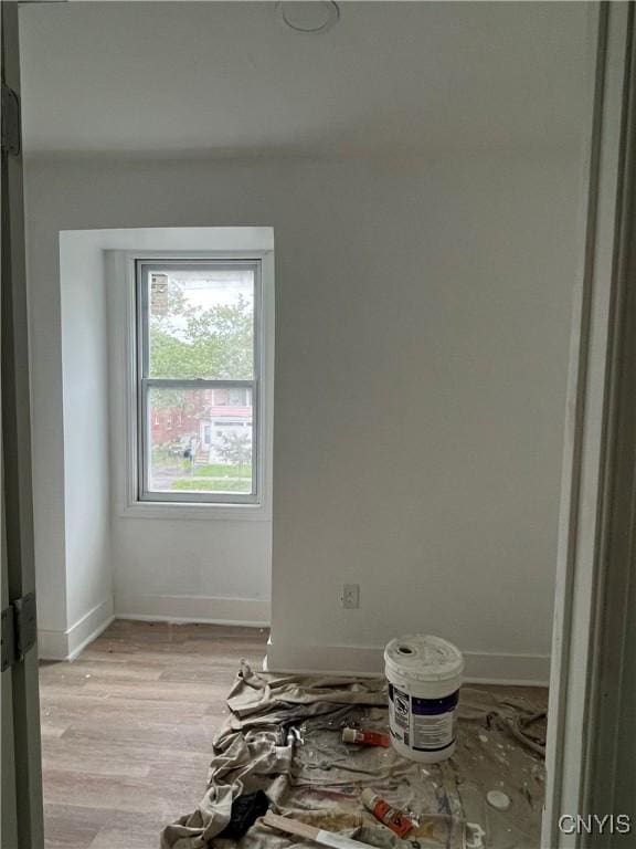 2608 Midland Ave, Syracuse, NY 13205 - spare room featuring baseboards and light wood-style flooring