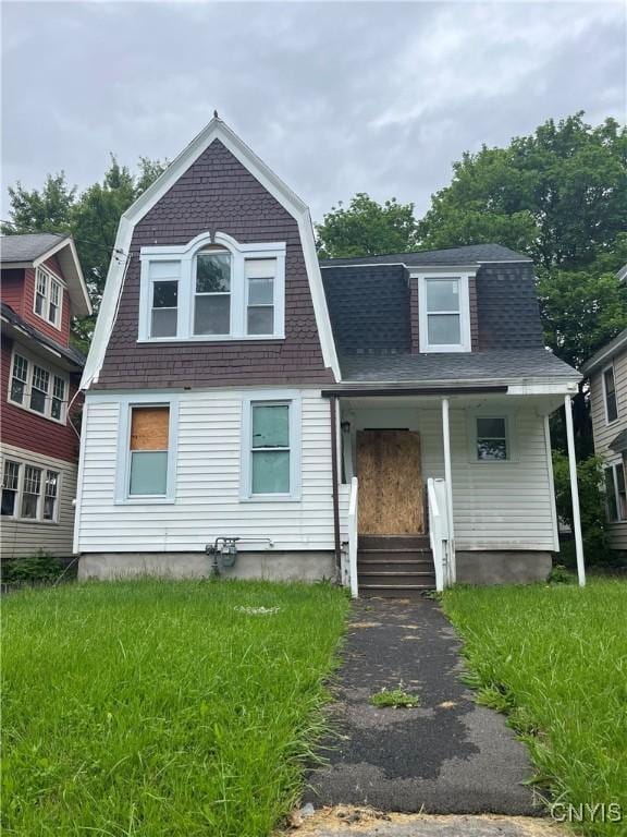 2608 Midland Ave, Syracuse, NY 13205 - dutch colonial with a gambrel roof, a porch, and roof with shingles