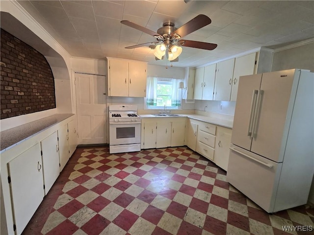 4003 Wood Rd, Albion, NY 14411 - kitchen with white appliances, light floors, light countertops, a sink, and white cabinets