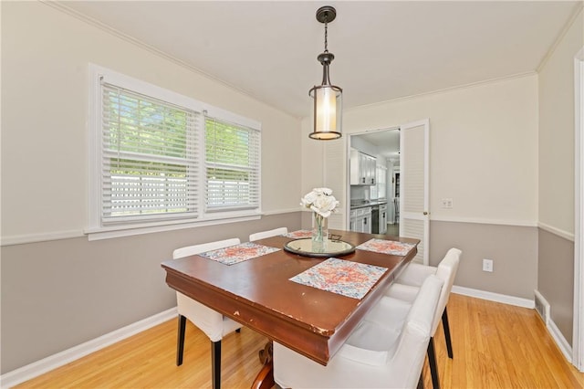 1 Briar Way, Perinton, NY 14450 - dining room featuring light wood finished floors, baseboards, and ornamental molding