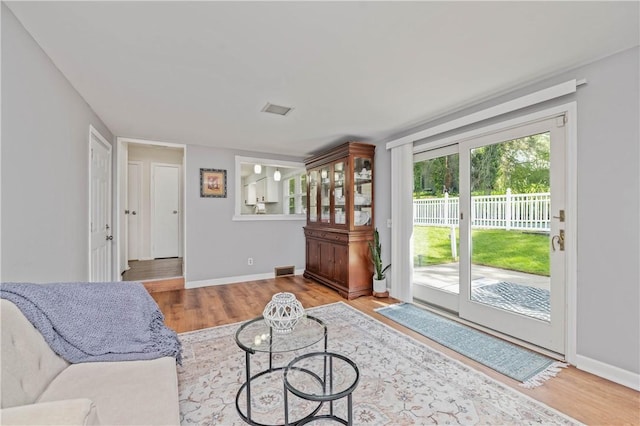 1 Briar Way, Perinton, NY 14450 - living area featuring wood finished floors and baseboards